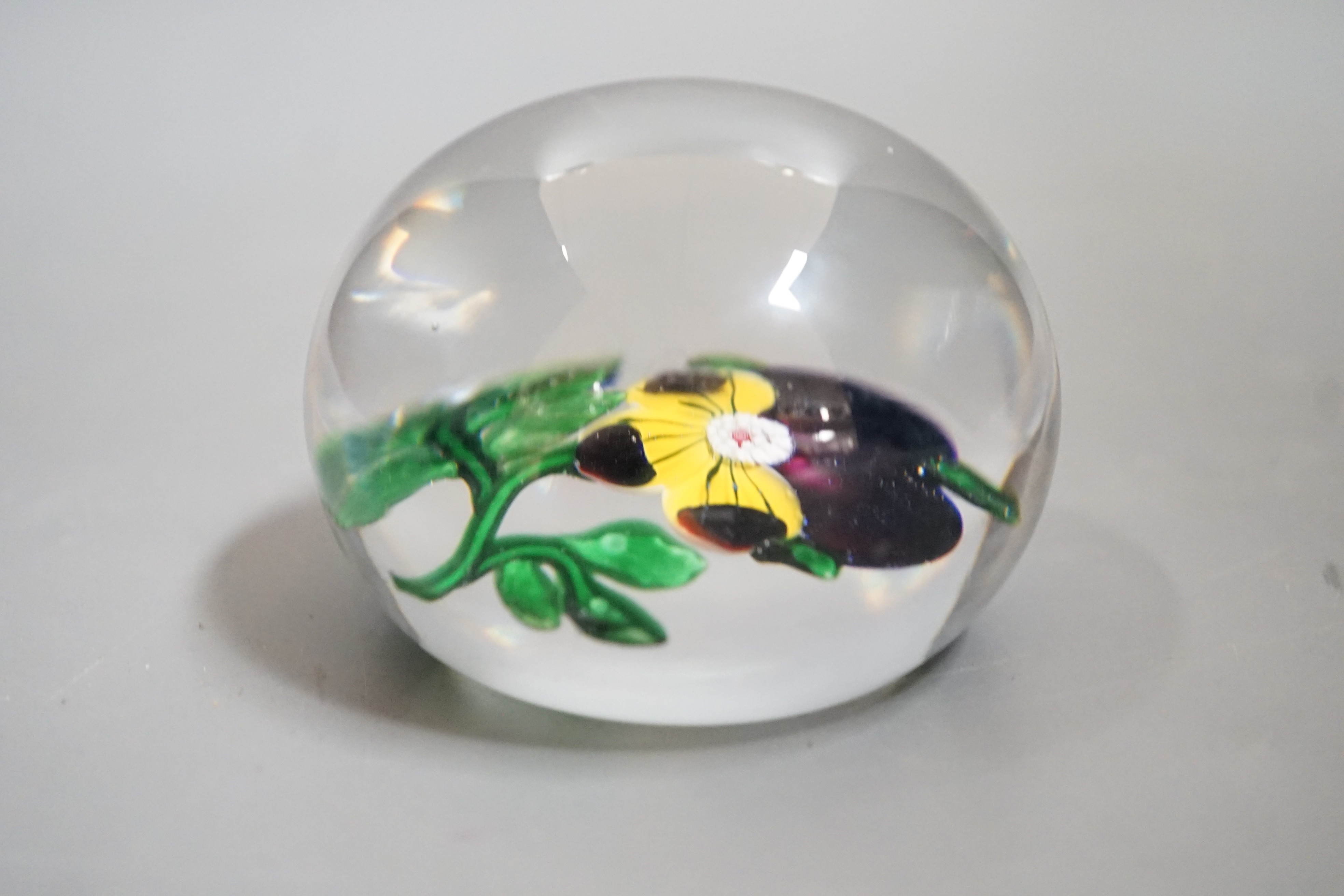 A 19th century Baccarat Pansy glass paperweight